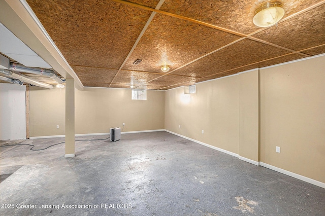 basement featuring baseboards