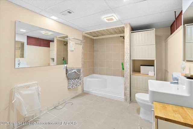 bathroom with toilet, visible vents, tile patterned flooring, and a shower