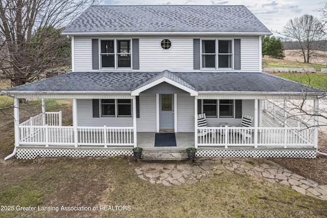 13577 Upton Rd, Bath, MI 48808 - view of front of house with a porch, a shingled roof, and a front lawn