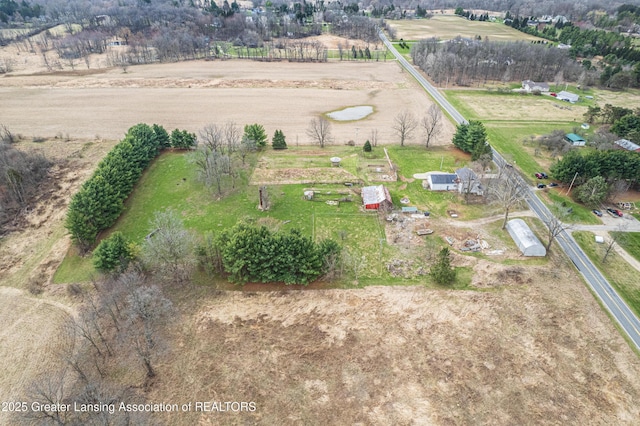 13577 Upton Rd, Bath, MI 48808 - aerial overview of property's location with rural landscape