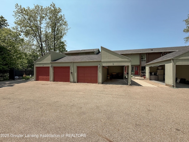 515 N Putnam St Unit B, Williamston, MI 48895 - view of front of house with a shingled roof