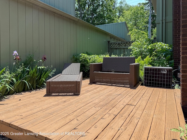 515 N Putnam St Unit B, Williamston, MI 48895 - deck with central air condition unit