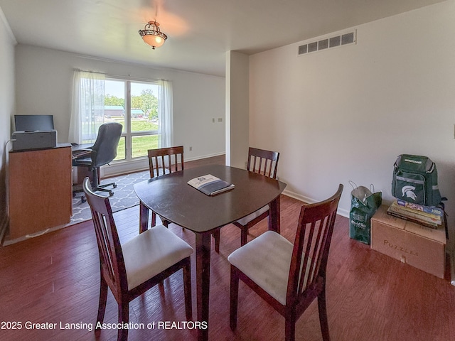 515 N Putnam St Unit B, Williamston, MI 48895 - dining area with wood finished floors and an office area