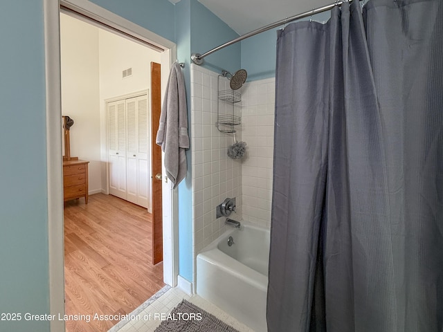 515 N Putnam St Unit B, Williamston, MI 48895 - bathroom with shower / tub combo and tile patterned floors