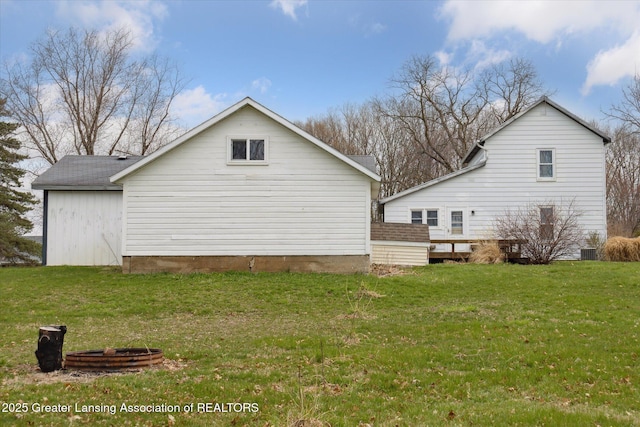 view of home's exterior with a yard