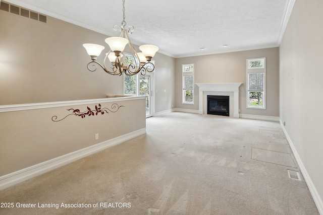 4163 Hamlet Cv, Bath, MI 48808 - unfurnished living room with crown molding, visible vents, carpet, and a notable chandelier