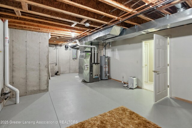 4163 Hamlet Cv, Bath, MI 48808 - unfinished below grade area featuring heating unit, electric panel, and gas water heater