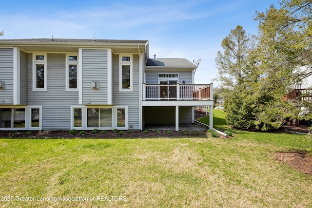 4163 Hamlet Cv, Bath, MI 48808 - rear view of property with a wooden deck and a lawn