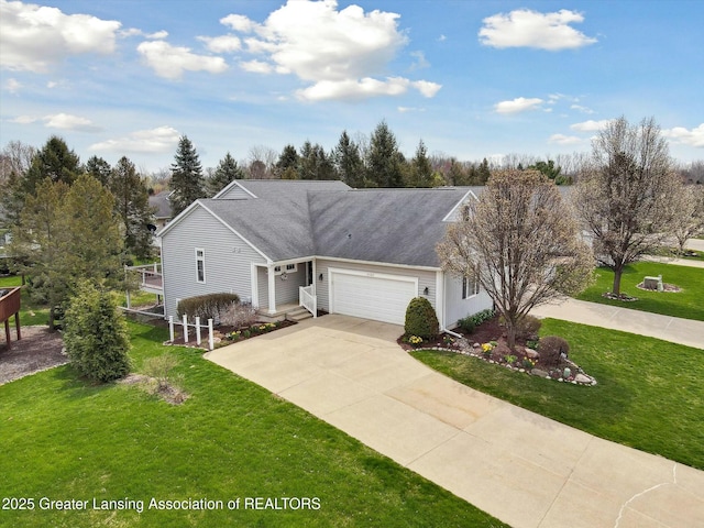 4163 Hamlet Cv, Bath, MI 48808 - single story home with concrete driveway, an attached garage, and a front lawn