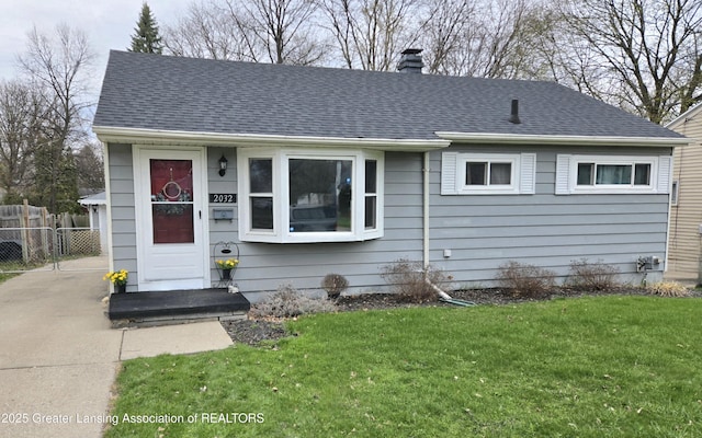 2032 Hillcrest St, Lansing, MI 48910 - view of front of property featuring a chimney and roof with shingles