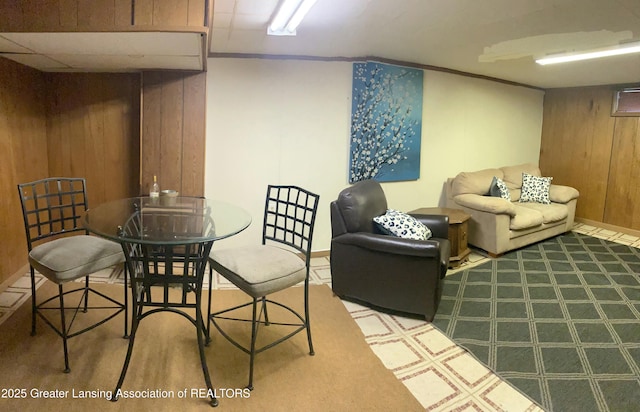 2032 Hillcrest St, Lansing, MI 48910 - finished basement featuring wooden walls and baseboards