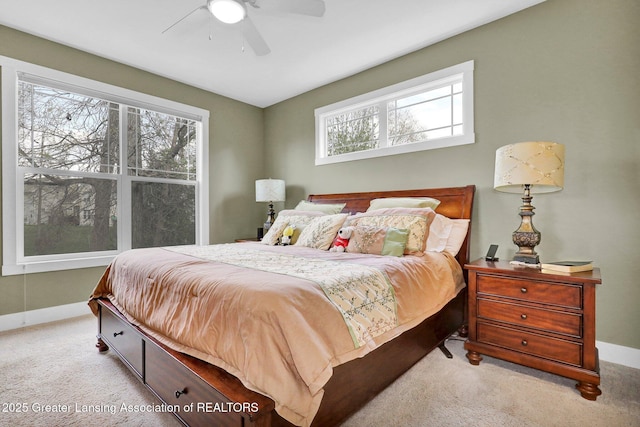 bedroom featuring carpet flooring, a ceiling fan, and baseboards