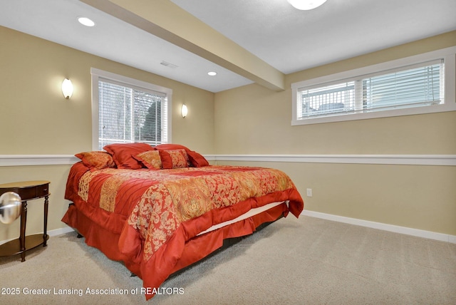 bedroom featuring recessed lighting, baseboards, multiple windows, and carpet