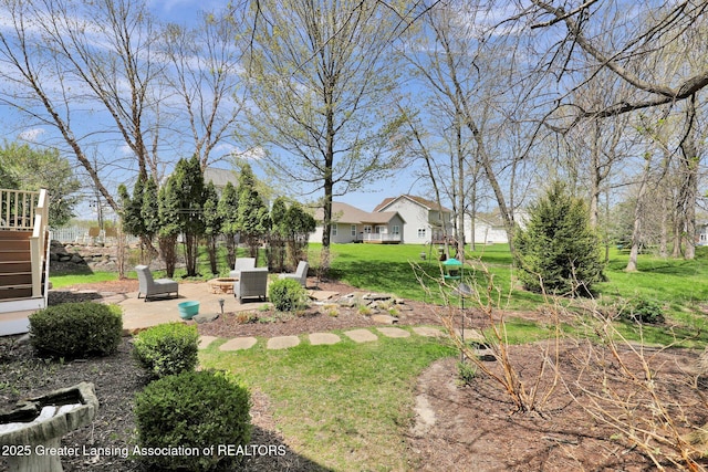 view of yard with a patio area