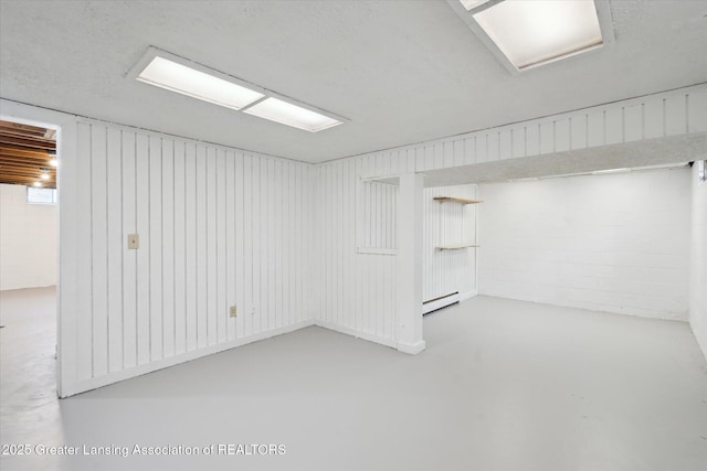3427 W Jolly Rd, Lansing, MI 48911 - basement featuring baseboard heating