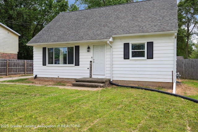 3427 W Jolly Rd, Lansing, MI 48911 - view of front of property featuring a shingled roof