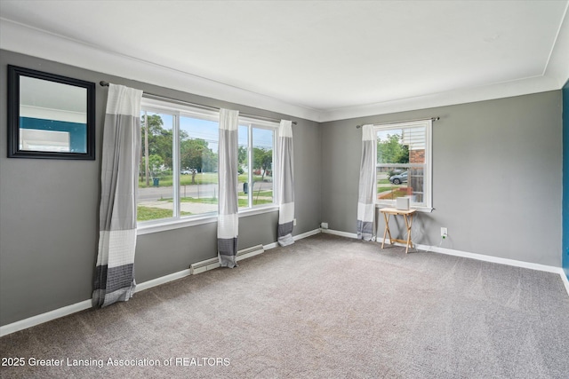 3427 W Jolly Rd, Lansing, MI 48911 - carpeted spare room featuring baseboards
