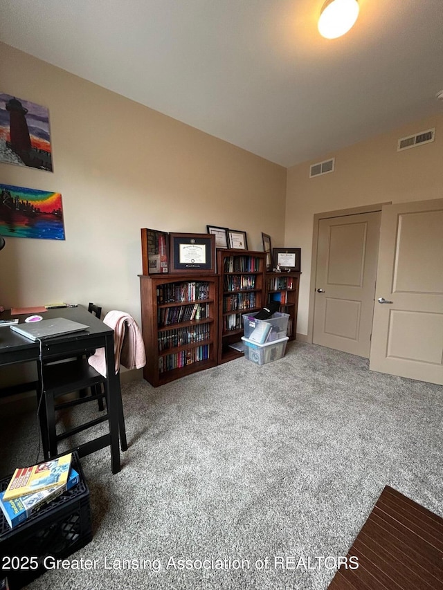 office space with carpet floors and visible vents