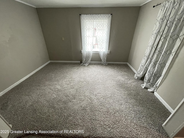 325 N Pennsylvania Ave, Lansing, MI 48912 - carpeted empty room with baseboards and crown molding