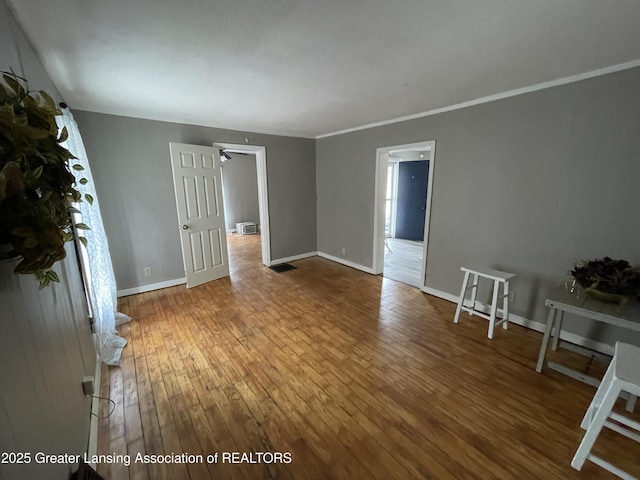 325 N Pennsylvania Ave, Lansing, MI 48912 - living room featuring wood-type flooring and baseboards