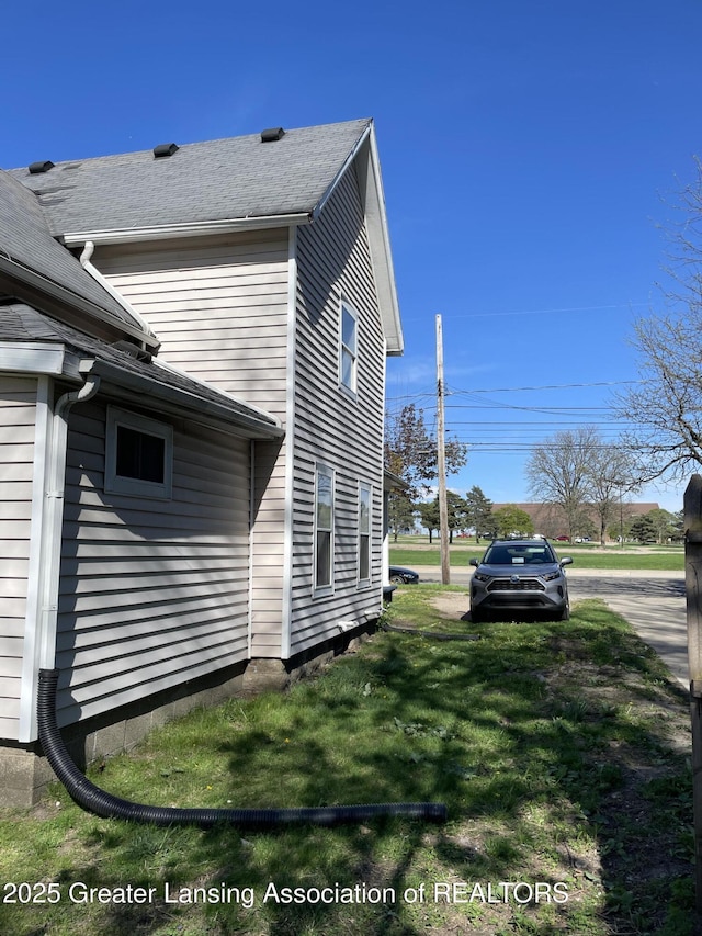 325 N Pennsylvania Ave, Lansing, MI 48912 - view of home's exterior featuring a lawn