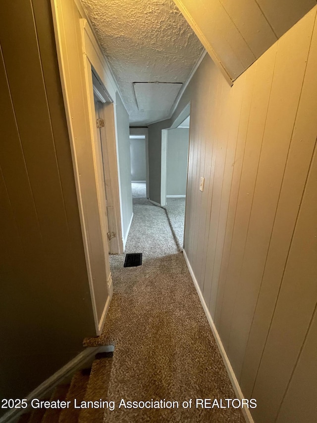 325 N Pennsylvania Ave, Lansing, MI 48912 - hall with carpet and a textured ceiling