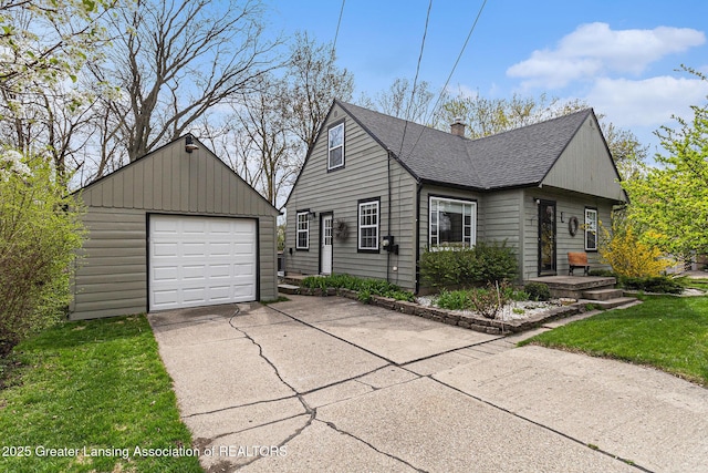 view of home's exterior with a garage, an outbuilding, a chimney, concrete driveway, and roof with shingles