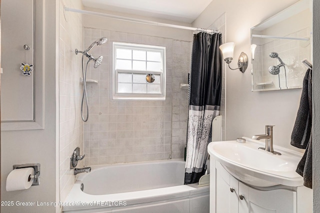 bathroom with toilet, shower / bath combo, and vanity