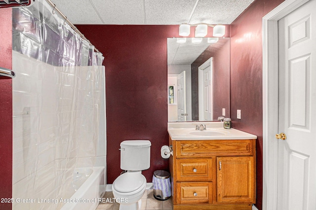 full bath with shower / tub combo, tile patterned floors, vanity, and toilet