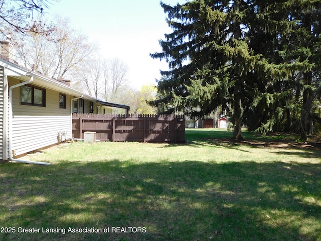 view of yard featuring fence