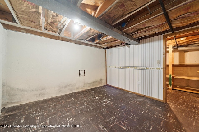 unfinished basement with tile patterned floors