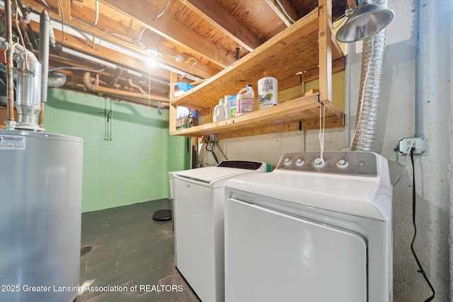 laundry area with washer and dryer, laundry area, and gas water heater