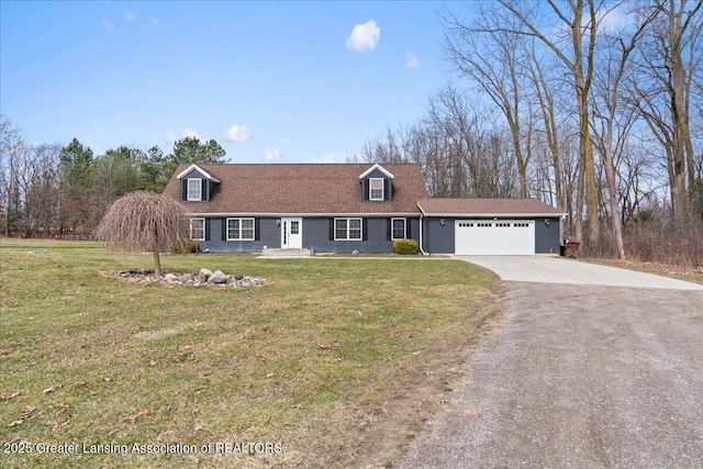 cape cod-style house with an attached garage, driveway, and a front yard