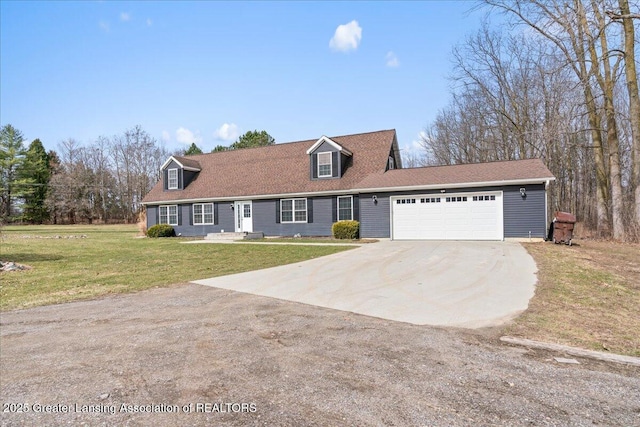 cape cod house with a garage, driveway, and a front lawn