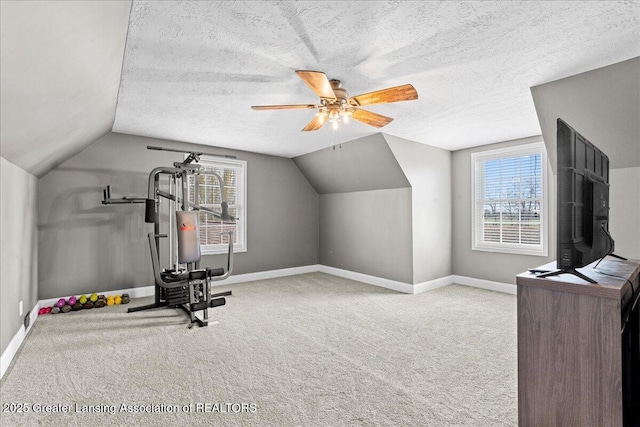 exercise area with carpet floors and baseboards