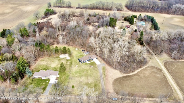 birds eye view of property with a rural view