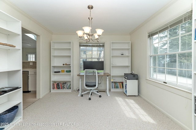 carpeted office featuring crown molding, baseboards, and an inviting chandelier