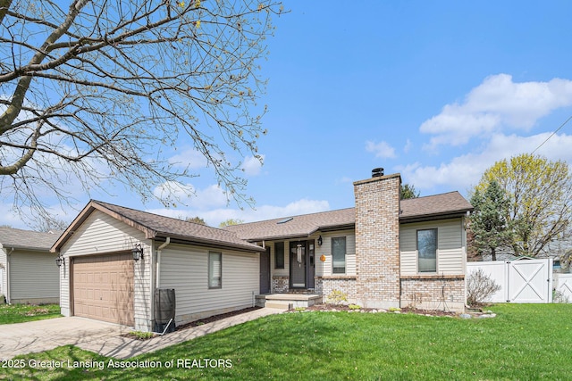 single story home featuring driveway, a chimney, a front yard, an attached garage, and fence