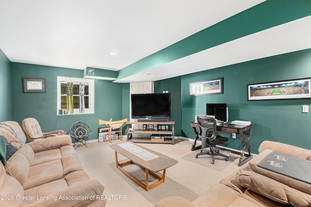 living room with carpet flooring and baseboards