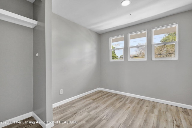 1435 New York Ave, Lansing, MI 48906 - empty room with baseboards and wood finished floors