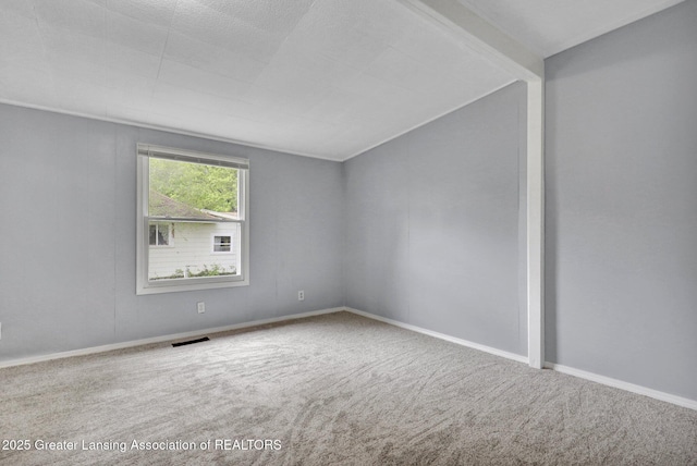 218 W Thomas St, Lansing, MI 48906 - carpeted empty room with visible vents and baseboards