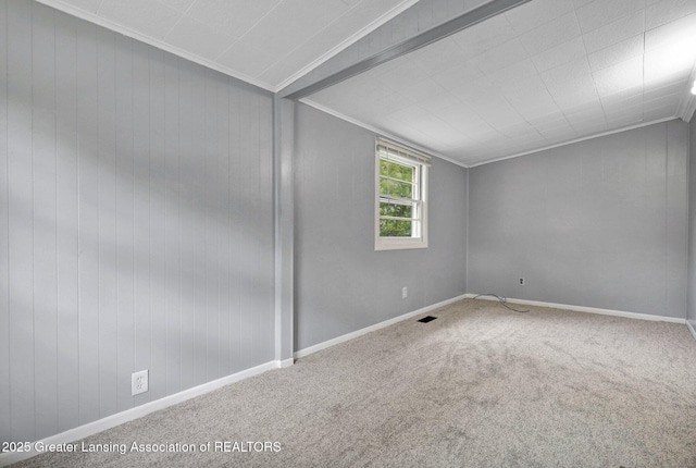 218 W Thomas St, Lansing, MI 48906 - carpeted spare room with crown molding, baseboards, and visible vents