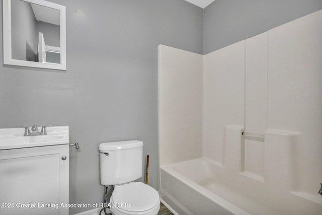 425 Filley St, Lansing, MI 48906 - full bath with vanity, toilet, and bathtub / shower combination