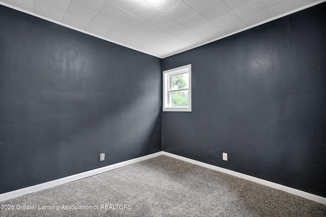 908 Larned St, Lansing, MI 48912 - unfurnished room with carpet floors and baseboards