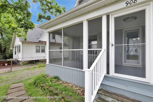 908 Larned St, Lansing, MI 48912 - entrance to property featuring roof with shingles