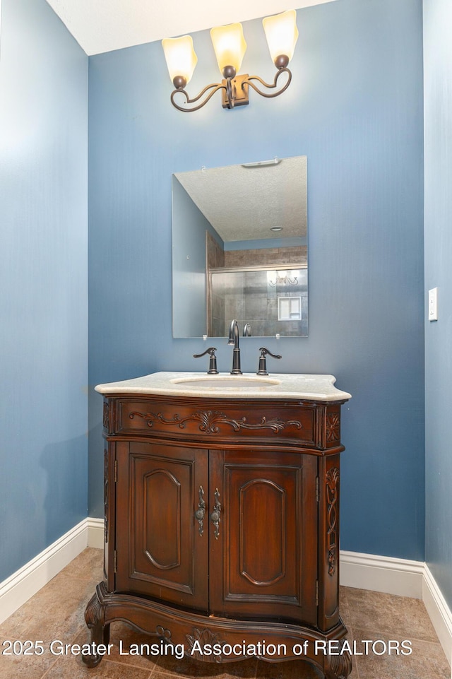 12714 Ospreys Way, Dewitt, MI 48820 - bathroom with vanity and baseboards