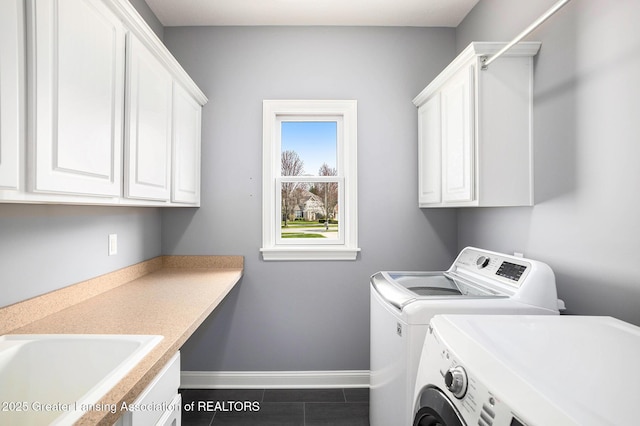 12714 Ospreys Way, Dewitt, MI 48820 - washroom with a sink, independent washer and dryer, cabinet space, and baseboards