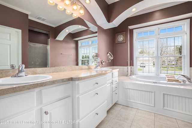12714 Ospreys Way, Dewitt, MI 48820 - full bath featuring tiled shower, tile patterned flooring, a bath, a sink, and visible vents