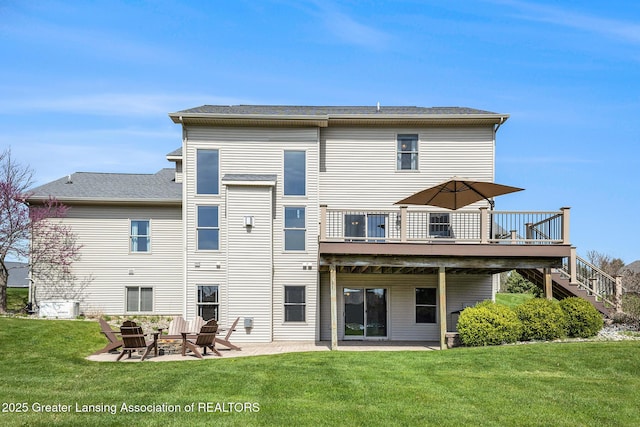 12714 Ospreys Way, Dewitt, MI 48820 - rear view of property with a deck, an outdoor fire pit, a yard, a patio, and stairs