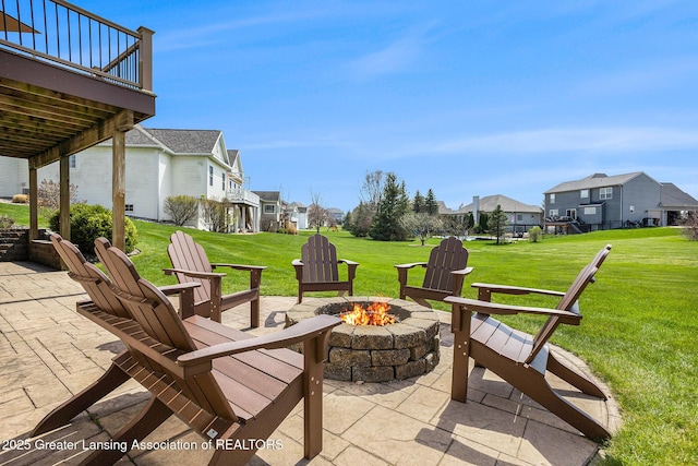12714 Ospreys Way, Dewitt, MI 48820 - view of patio with a residential view and an outdoor fire pit
